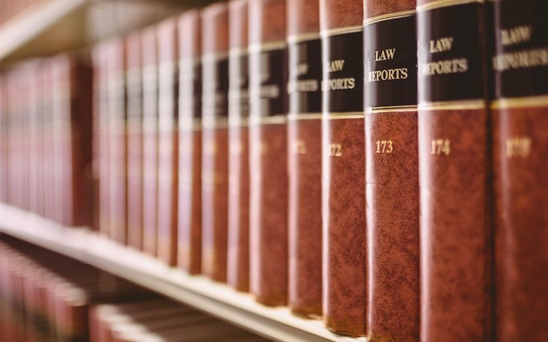 Close up of a lot of law reports in library